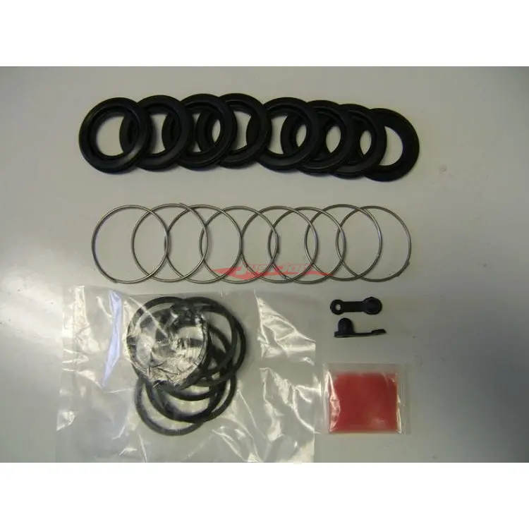 Genuine Nissan Front Brake Caliper Repair Kit Fits Nissan S14/S15 Silvia, R32/R33/R34 Skyline & Z32 300Zx (Sumitomo 4 Piston) 1