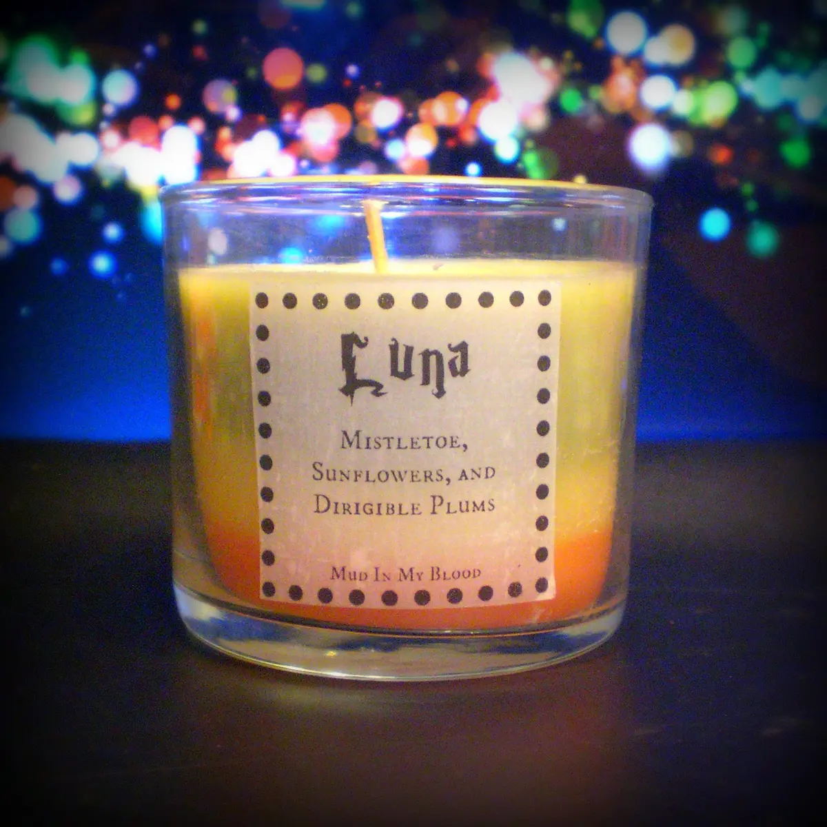 Moon Child 4 Oz Candle: Mistletoe, Sun Flowers, And Plums 1