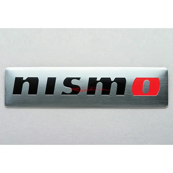 Nismo Metal Emblem - Silver Brushed Aluminium (25Mm X 100Mm) 1